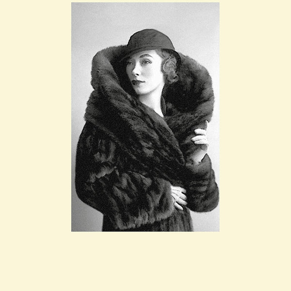 MADONA CON ABRIGO DE PIEL